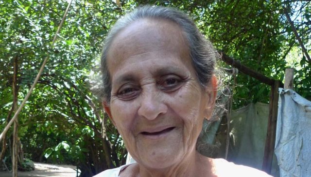 A woman poses for the camera
