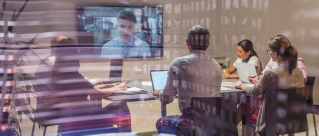Blurred patch of photos representing a video conference